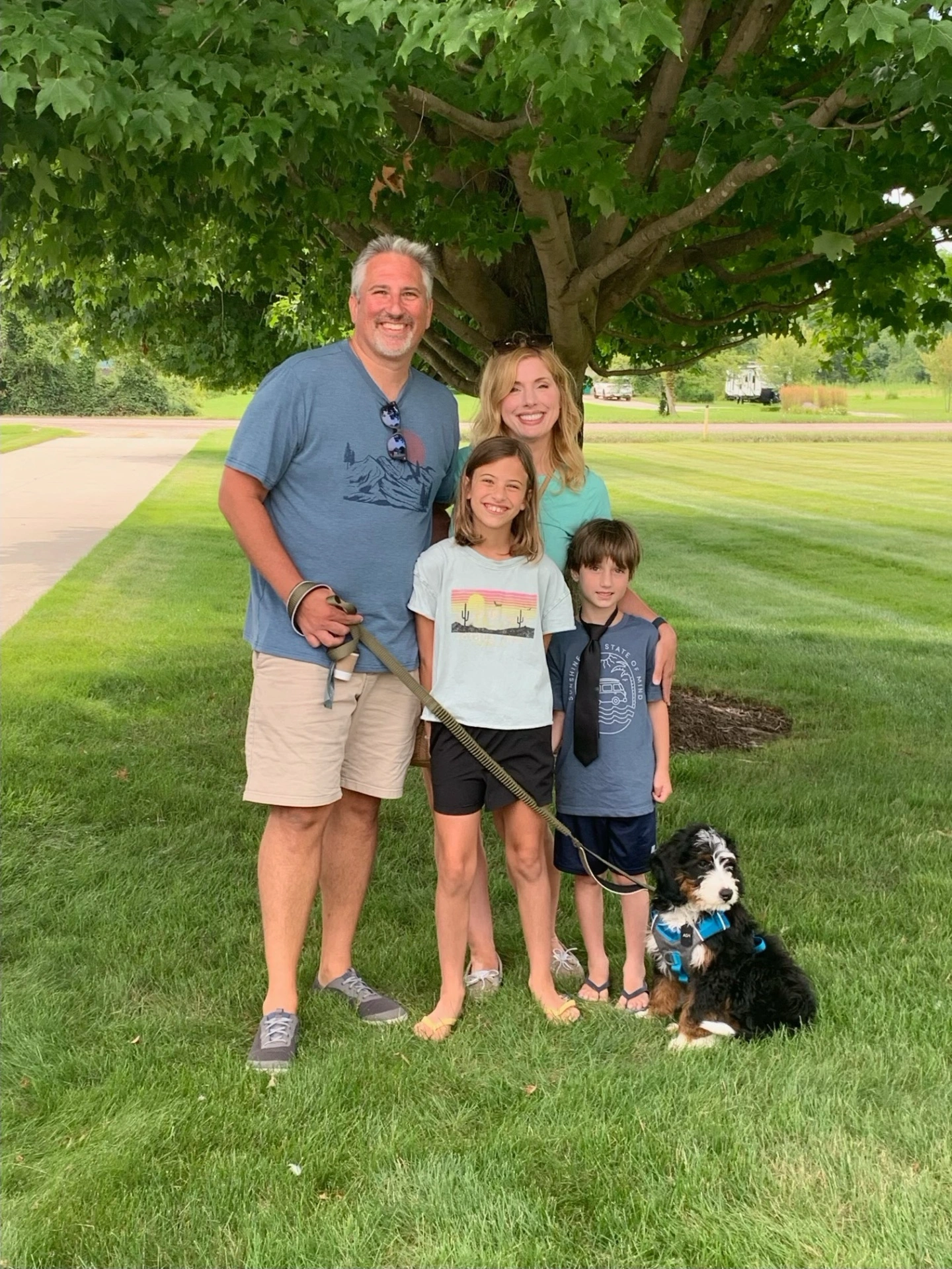 Family pictures with Bernedoodle